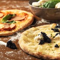 Pizza caviar -pizza salami at Vegan Only Pizza in Athens