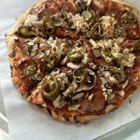 Pepperoni mushroom jalapeño vegan cheese pizza. Super thin    at Lanesplitter Pizza in Emeryville