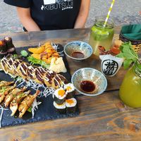 Black Avo Zalmon, Shrimpless Tempura, Crispy Avo Zalmon, Gyoza and Pumpkin Fury. On the right the drinks Oishi and Nori lemonade. at Nori in Potsdam