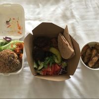 Bean and mushroom burger, veggie kofte mezze salad and wedges take out. at The Kitchen on Great Moor Street in Bolton