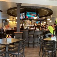 Bar in background  at Sage Karma Kitchen in Willoughby