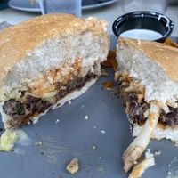 Black bean burger. The bread, sauce, burger combo was a party in my mouth. Came with sweet potato chips that were well done. I dipped them in ranch    at Sage Karma Kitchen in Willoughby