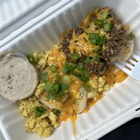 MC Hammer w sausage  at Biscuits + Groovy - Food Trailer Hyde Park in Austin