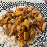 Tofu/chicken and veg curry, boiled rice and garlic and chilli chips (half of my portion!)   at Oriental Chef in Wolverhampton