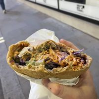 Half eaten falafel   at Falafel + in London