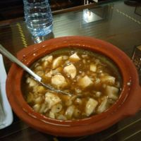 Tofu and mushroom in a pot at Truc Lam Trai in Hanoi