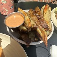 Baked garlic fries. Small  at Rock n Roots in Williston Park