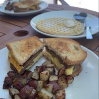 Breakfast sandwich & gluten free waffle  at Earthly Cafe in Somers Point