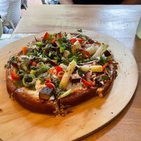 Tarte flambee with pretzel dough at Esskalation in Bonn