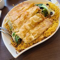 Crispy Noodles With Mock Duck And Vegetables at Greens Vegetarian Restaurant in Toronto