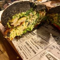 Poppea burger with zucchini falafel, fried onion rings, guacamole sauce, selettive  at Agrippina Street Food in Pula