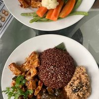 Beautiful meal! Peanut stew, eggplant stew, red rice and tofu cubes in soy and lime  at Peanuts in Hoi An
