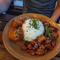 Rice, orange chicken and tomato tofu balls at Peanuts in Hoi An