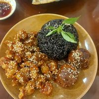 Black rice with orange chicken and tofu meatballs at Peanuts in Hoi An