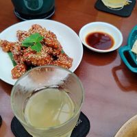 Orange chicken and rice crackers at Peanuts in Hoi An