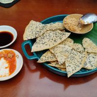Rice crackers and a sample of peanut stew at Peanuts in Hoi An
