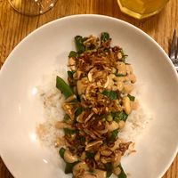 Vainas salteada, crema de cacahuetes y arroz  at Orburu Taberna in San Sebastian