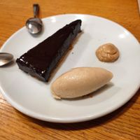 Tarta de chocolate negro, sorbete de plátano y crema de cacahuete at Orburu Taberna in San Sebastian