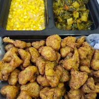 Fried cauliflower, creole greens, creamed corn   at Meals that Heal in Jackson