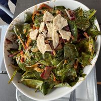 Extremely overdressed salad   at Alua's Thrive Bar in Mount Shasta