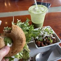 Couldn’t wait sorry but Blasted Vegan on gf bagel with chili and green smoothie !!   at Alua's Thrive Bar in Mount Shasta