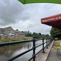 Seating by river   at Cat Soup Kitchen in Brecon