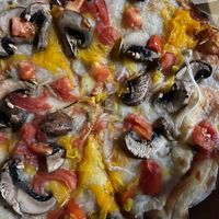 Custom pizza order at Vegan Pizzeria in San Juan