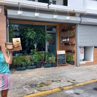 Wife with the goods 😋 at Vegan Pizzeria in San Juan