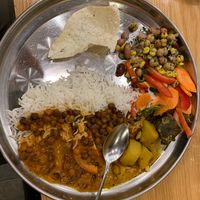 Fun giant metal plates at Shayona Restaurant in North West London