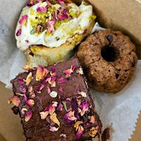 Cardamom cake with rose chocolate buttercream, Chai banana bundt bread,  cardamom pistachio rose roll at Shru's Kitchen  in San Mateo