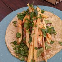 Mushroom Taco topped with fries at Seta Rosa in Ensenada