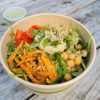 Chickpea quinoa arugula salad bowl at Zest in Traverse City