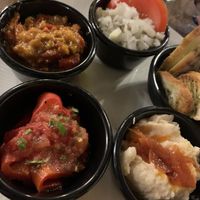 vegetarian platter (smoked eggplant, white bean paste, white bean casserole and pickled red bell pepper)  at Caru' cu Bere in Bucharest