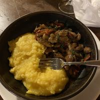 Mushroom stew and polenta  at Caru' cu Bere in Bucharest
