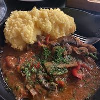 Mushroom stew with polenta  at Caru' cu Bere in Bucharest