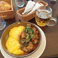 Polenta with mushrooms at Caru' cu Bere in Bucharest