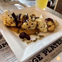 Seared cauliflower app with hummus and pickled beets   at Daily Planet in Burlington