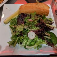 Grilled sausage sandwich with Beyond Meat bratwurst at Daily Planet in Burlington
