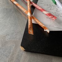 Pixie sticks come with the check!  at Daily Planet in Burlington