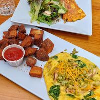 Omelet and fritatta with hash browns at Daily Planet in Burlington
