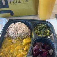 Vegan stew, rice and peas, beets, collard greens, mango juice!  at Jerk'D Caribbean Kitchen in Hackensack