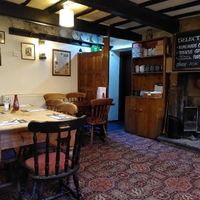Cosy pub with fireplace at The Cheshire Cheese Inn in Hope