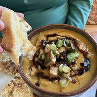 Sweet potato soup with tofu. Comes with locally made sourdough    at Steamy Buddha in Ellsworth