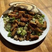 tempeh caesar salad with marble rye toast  at Morning Glory Cafe in Eugene