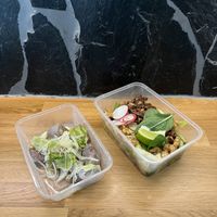 Dim sum hernis and Burmese tea leaves spicy salad.  at Thai Vegan Kitchen in Helsinki