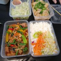 Here are the two entrees we bought, plus rice and a salad. at Thai Vegan Kitchen in Helsinki