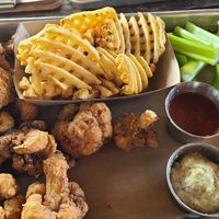 Buffalo cauliflower with pickled peppers, vegan ranch, waffle fries at Lost Forty Brewing in Little Rock