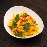 Papaya Salad

Fresh papaya in an orange gochugaru vinaigrette, tossed with house-pickled jalapeno and crushed peanuts at Saffron in Las Vegas