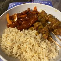 Vegan crispy chilli beef and vegan satay skewers  at Woks Bar and Restaurant in Brandon