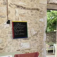 Advertisement for vegan pizza at Arismari in Crete